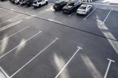 Photo of Outdoor car parking lot on sunny day