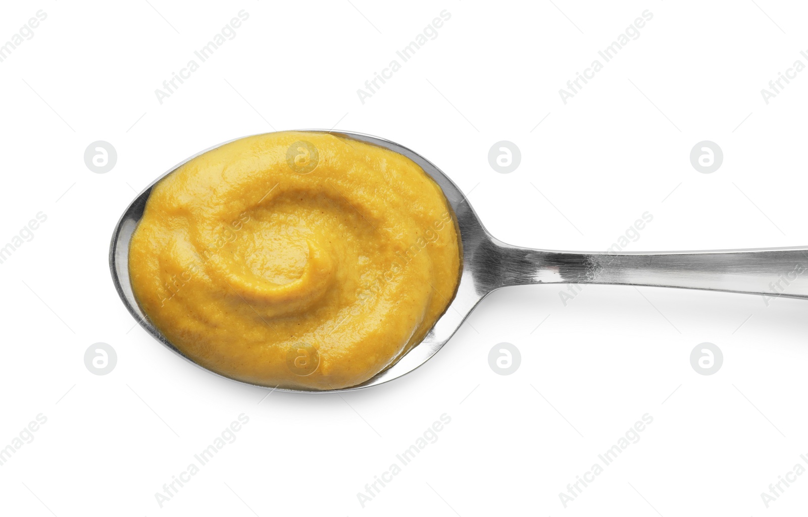 Photo of Fresh mustard sauce and spoon isolated on white, top view