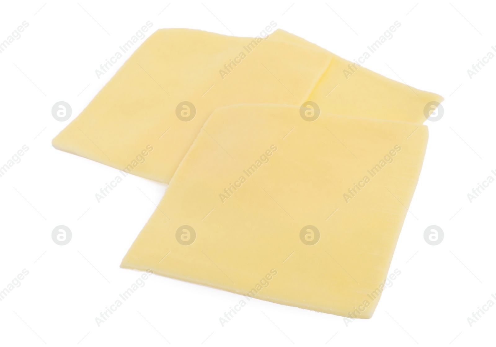 Photo of Slices of tasty fresh cheese isolated on white, above view