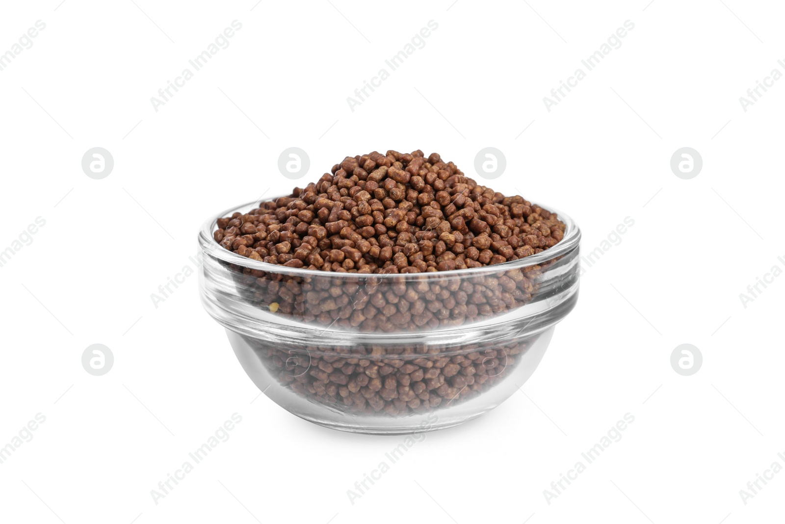 Photo of Buckwheat tea granules in glass bowl on white background