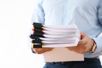 Businessman with documents in office, closeup. Space for text