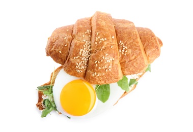 Photo of Delicious croissant with arugula and egg isolated on white, top view