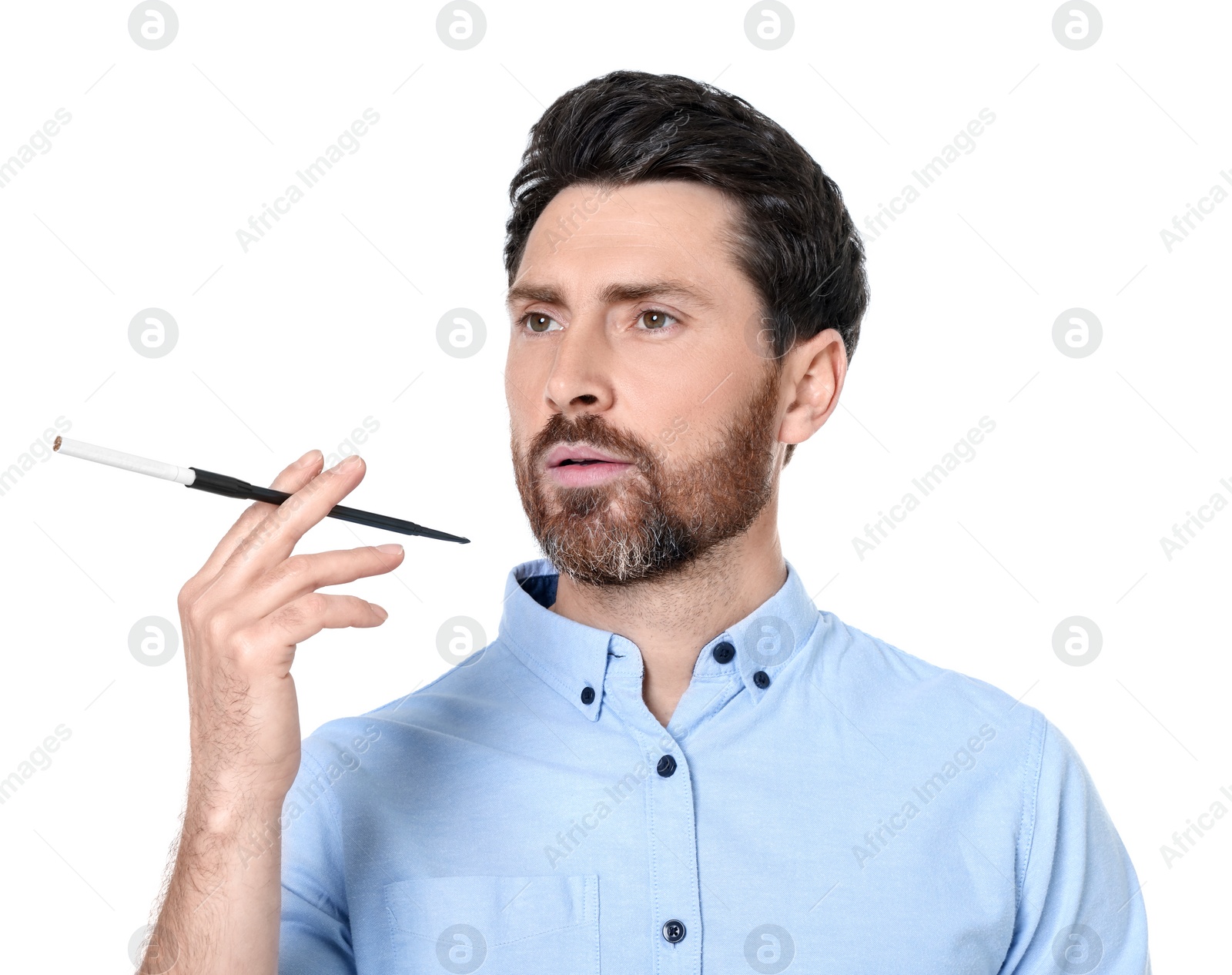 Photo of Man using long cigarette holder for smoking isolated on white