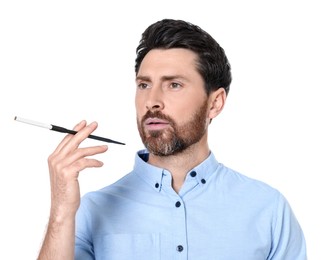 Man using long cigarette holder for smoking isolated on white