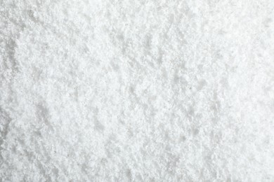 Photo of Pile of white snow as background, top view