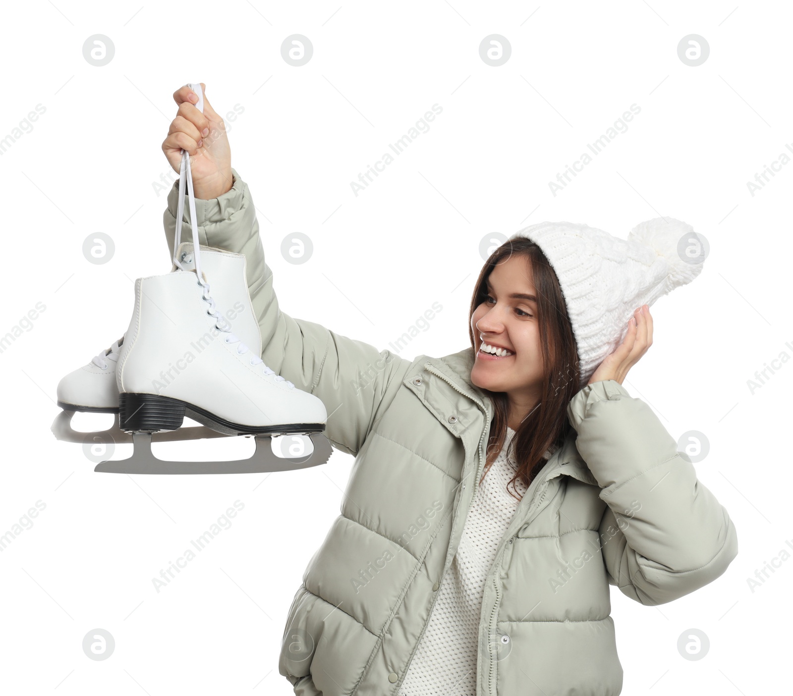 Photo of Happy woman with ice skates on white background