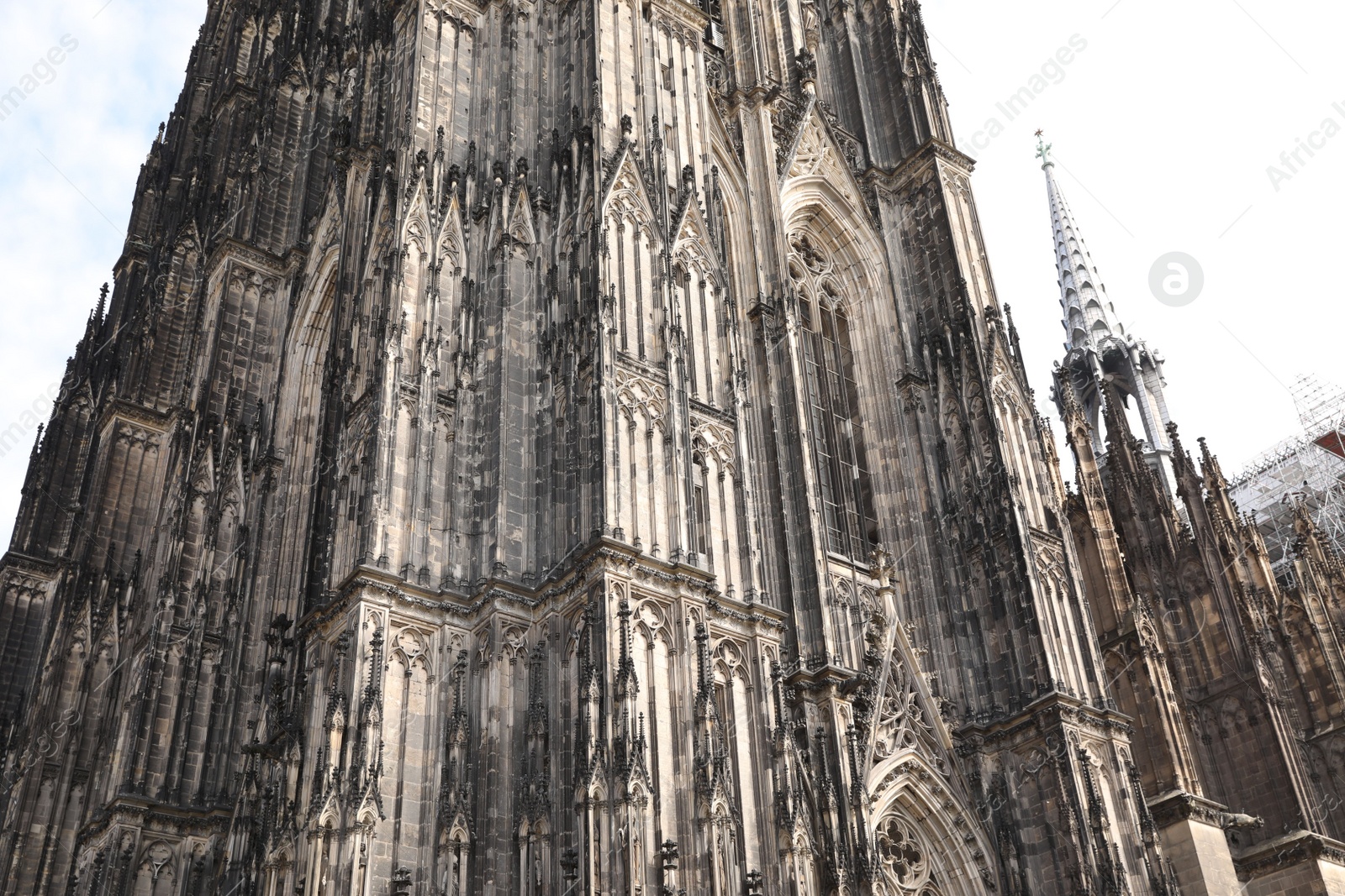 Photo of Cologne, Germany - August 28, 2022: Beautiful old gothic cathedral against blue sky