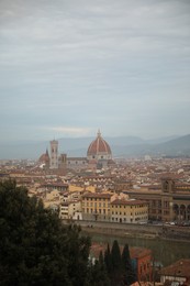 Florence, Italy - February 8, 2024: Picturesque view of city with beautiful buildings under sky