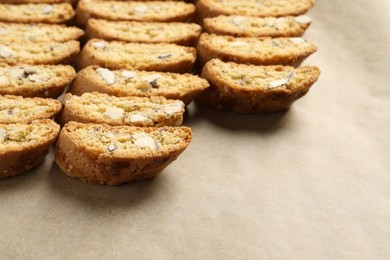 Photo of Traditional Italian almond biscuits (Cantucci) on parchment paper