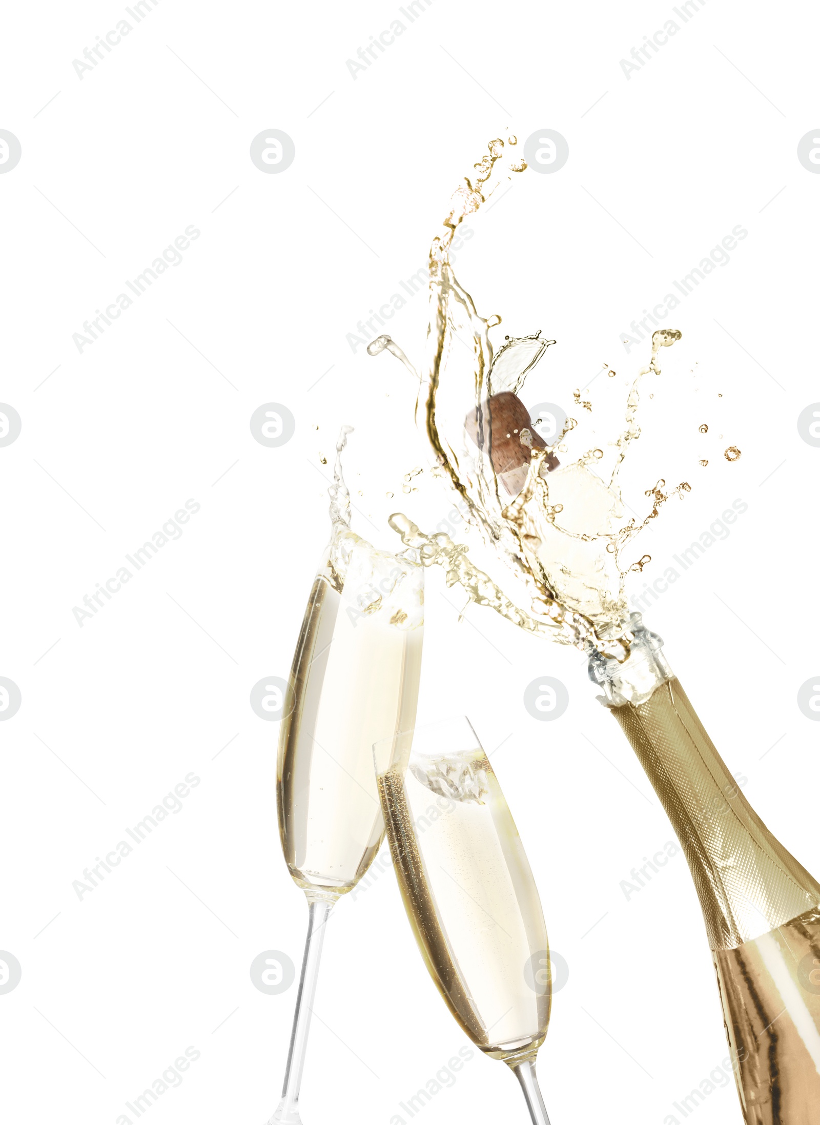 Image of Sparkling wine splashing out of bottle and glasses on white background