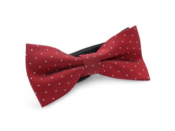 Photo of Stylish burgundy bow tie with polka dot pattern on white background