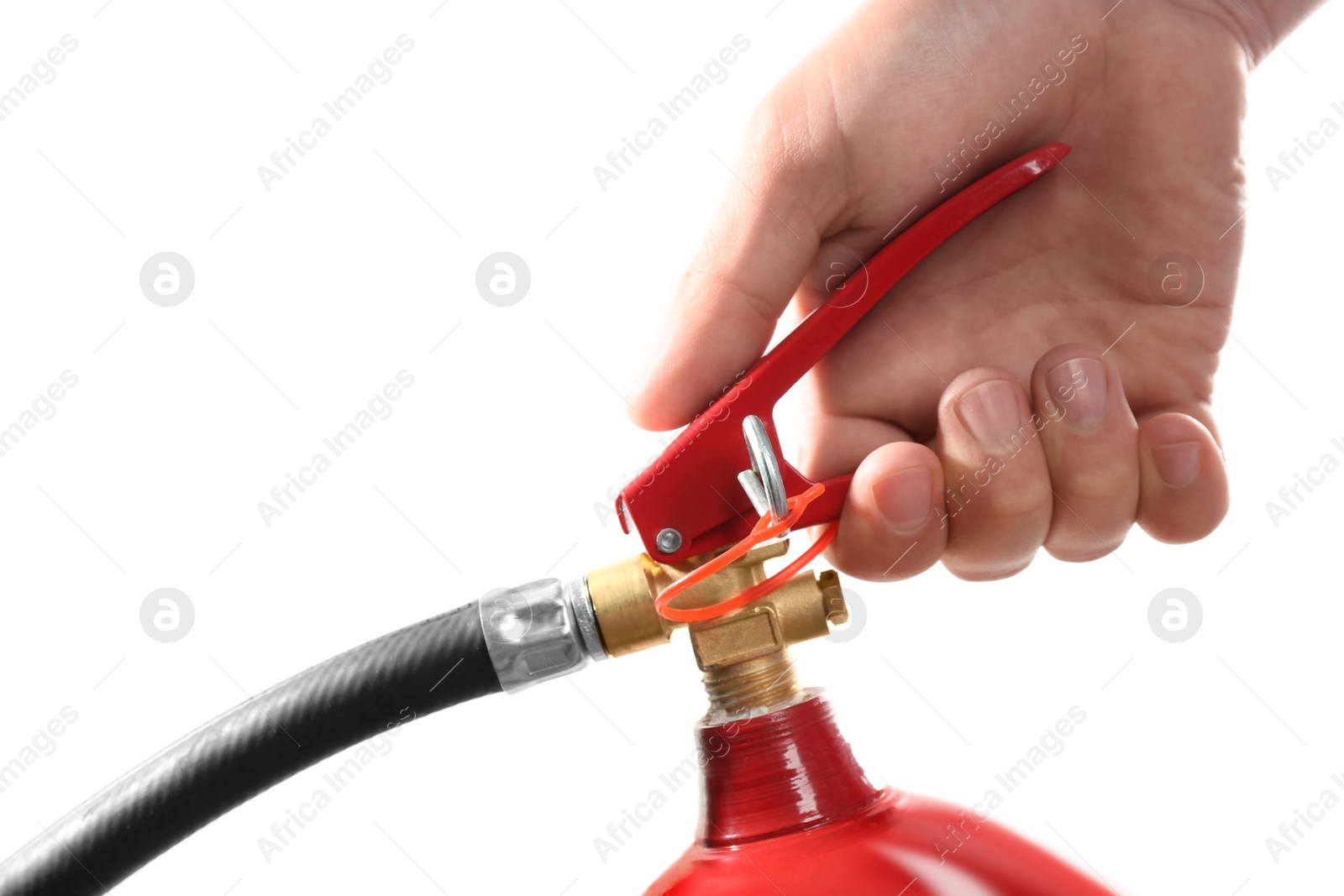 Photo of Man using fire extinguisher on white background, closeup