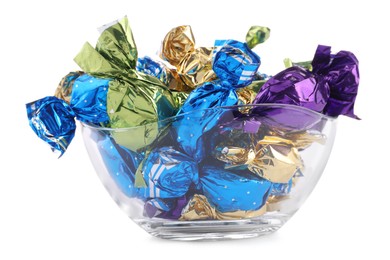 Bowl with candies in colorful wrappers isolated on white