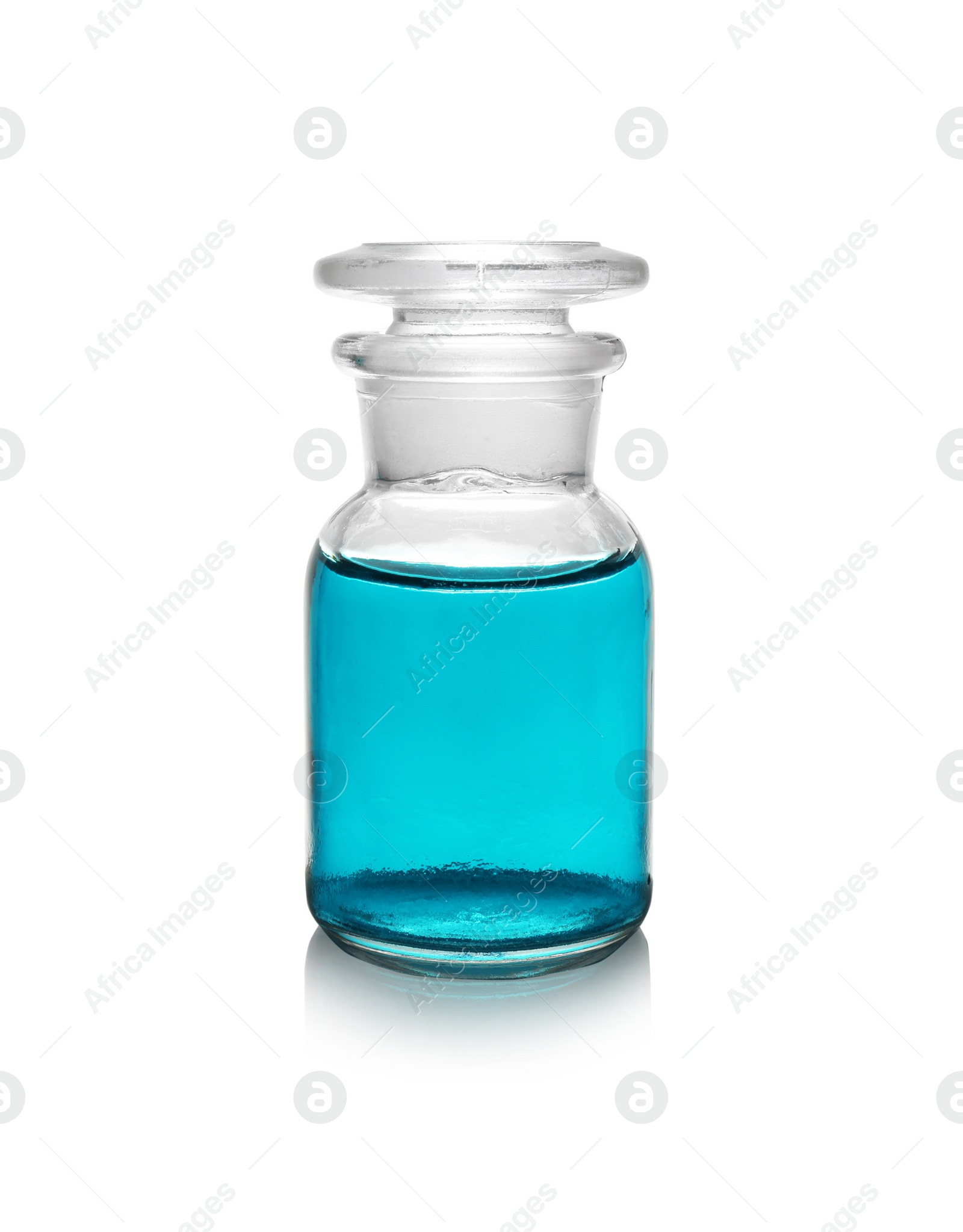 Photo of Glass reagent bottle with color liquid on white background. Solution chemistry