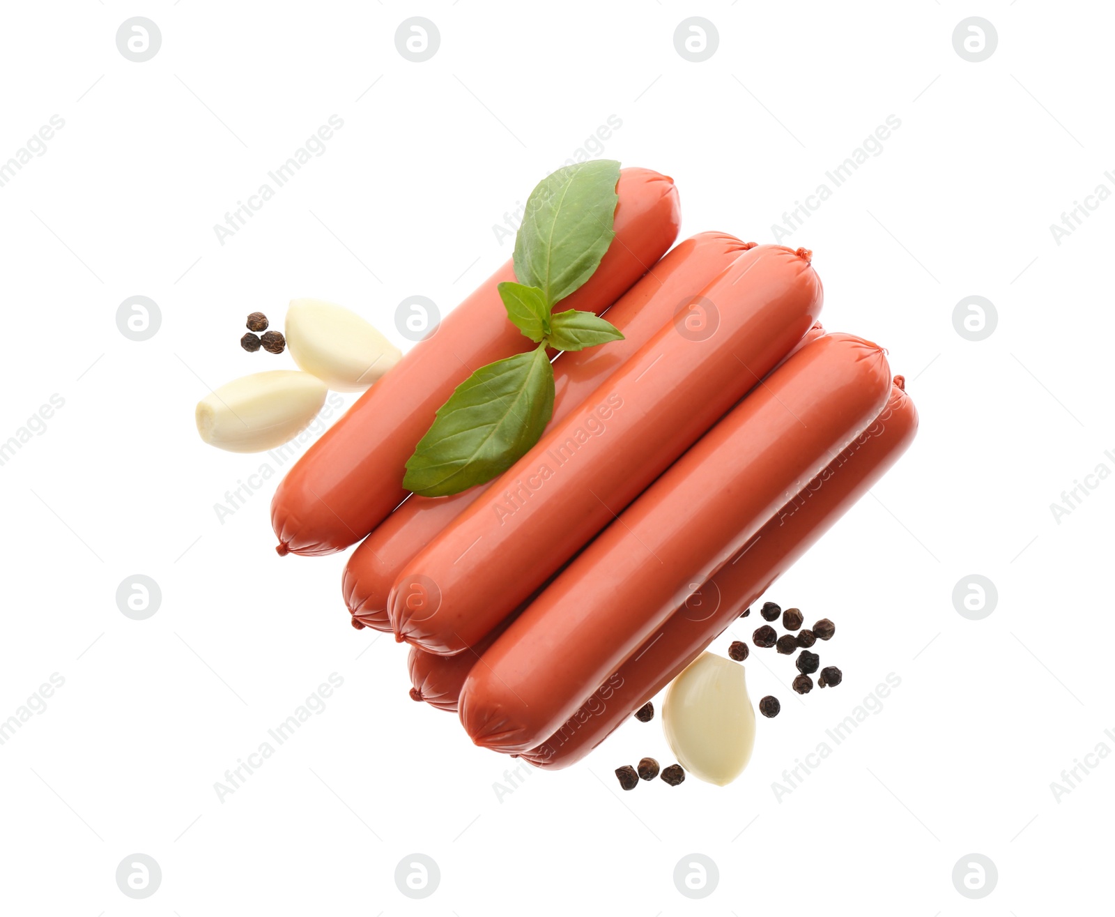 Photo of Fresh raw vegetarian sausages, basil and garlic on white background, top view