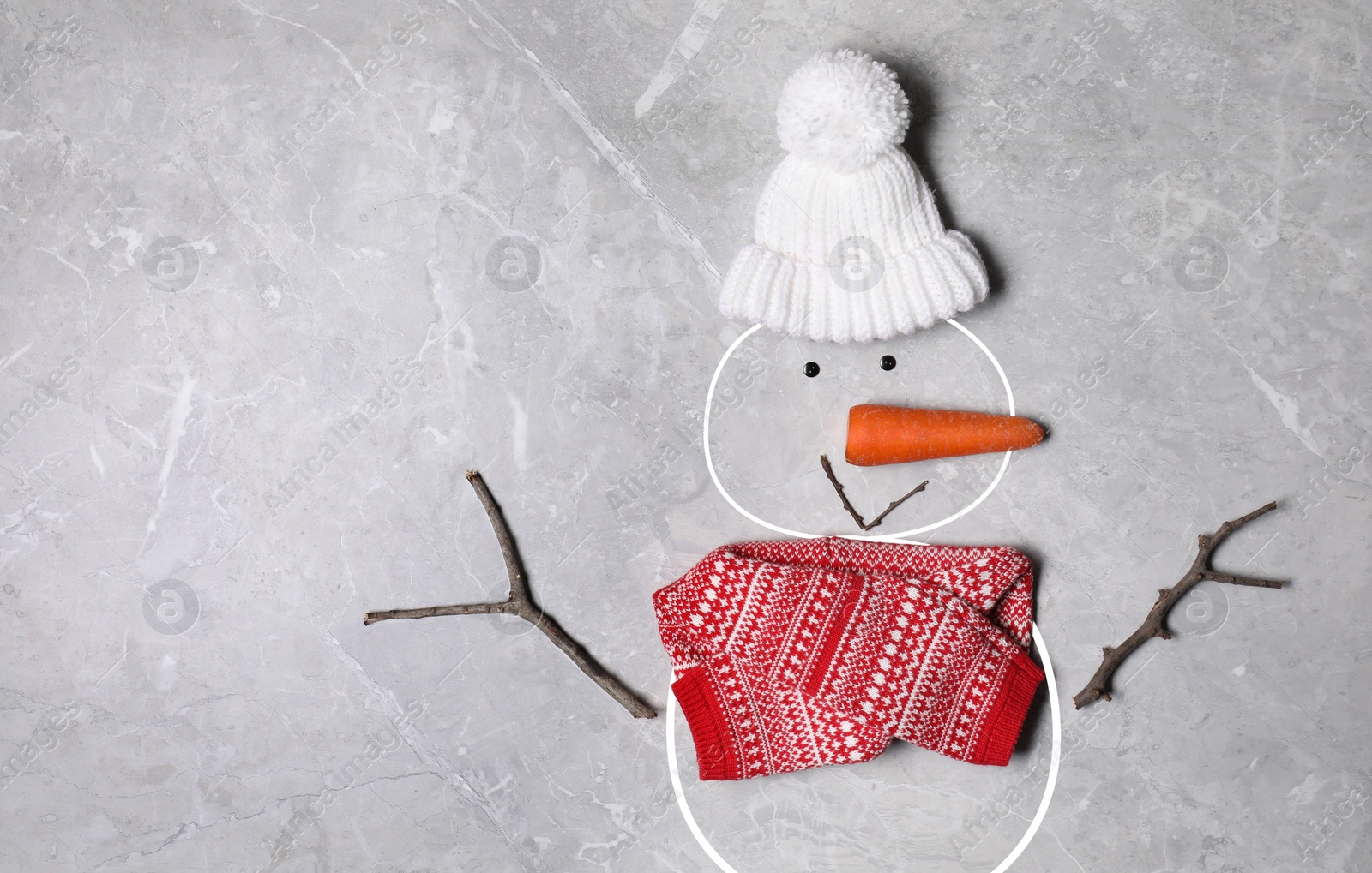 Image of Snowman with hat and scarf on grey background, flat lay. Space for text