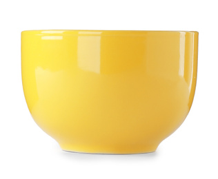 Photo of New yellow ceramic bowl isolated on white