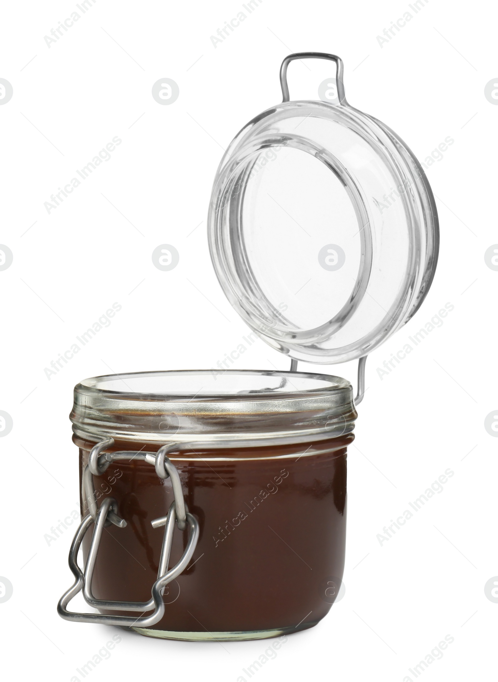 Photo of Tasty barbecue sauce in glass jar isolated on white