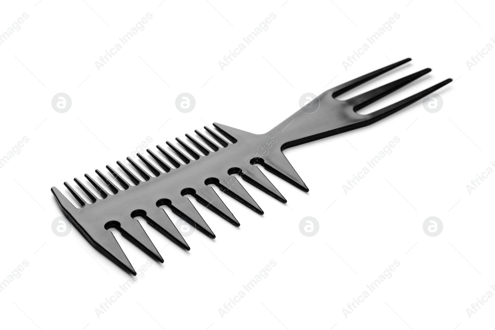 Photo of New plastic hair comb isolated on white