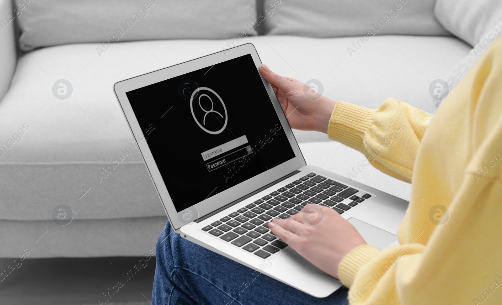 Photo of Woman unlocking laptop with blocked screen indoors, closeup