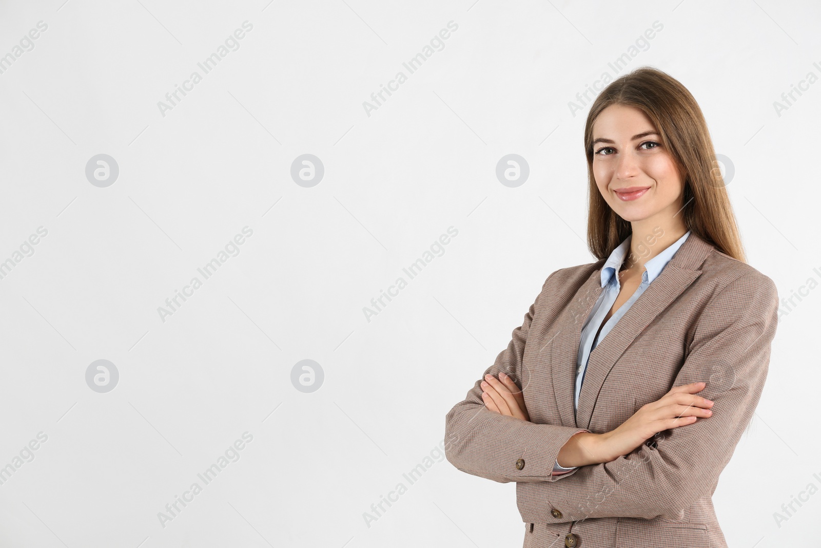 Photo of Portrait of beautiful young businesswoman on white background. Space for text