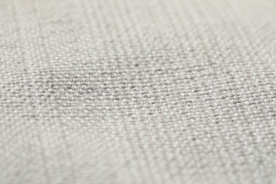 Photo of Texture of soft light grey fabric as background, closeup