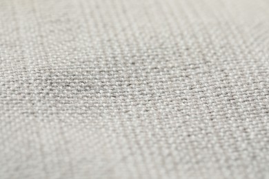 Texture of soft light grey fabric as background, closeup