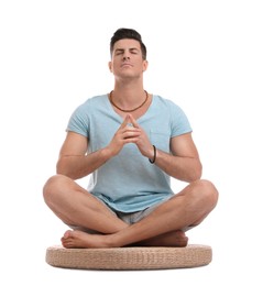 Man meditating on white background. Zen concept