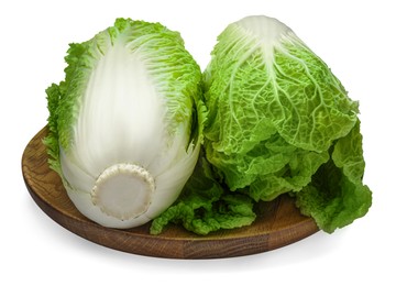 Photo of Fresh tasty Chinese cabbages and wooden board on white background
