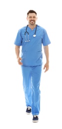 Full length portrait of smiling male doctor in scrubs isolated on white. Medical staff