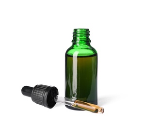 Photo of Cosmetic bottle and pipette with essential oil on white background