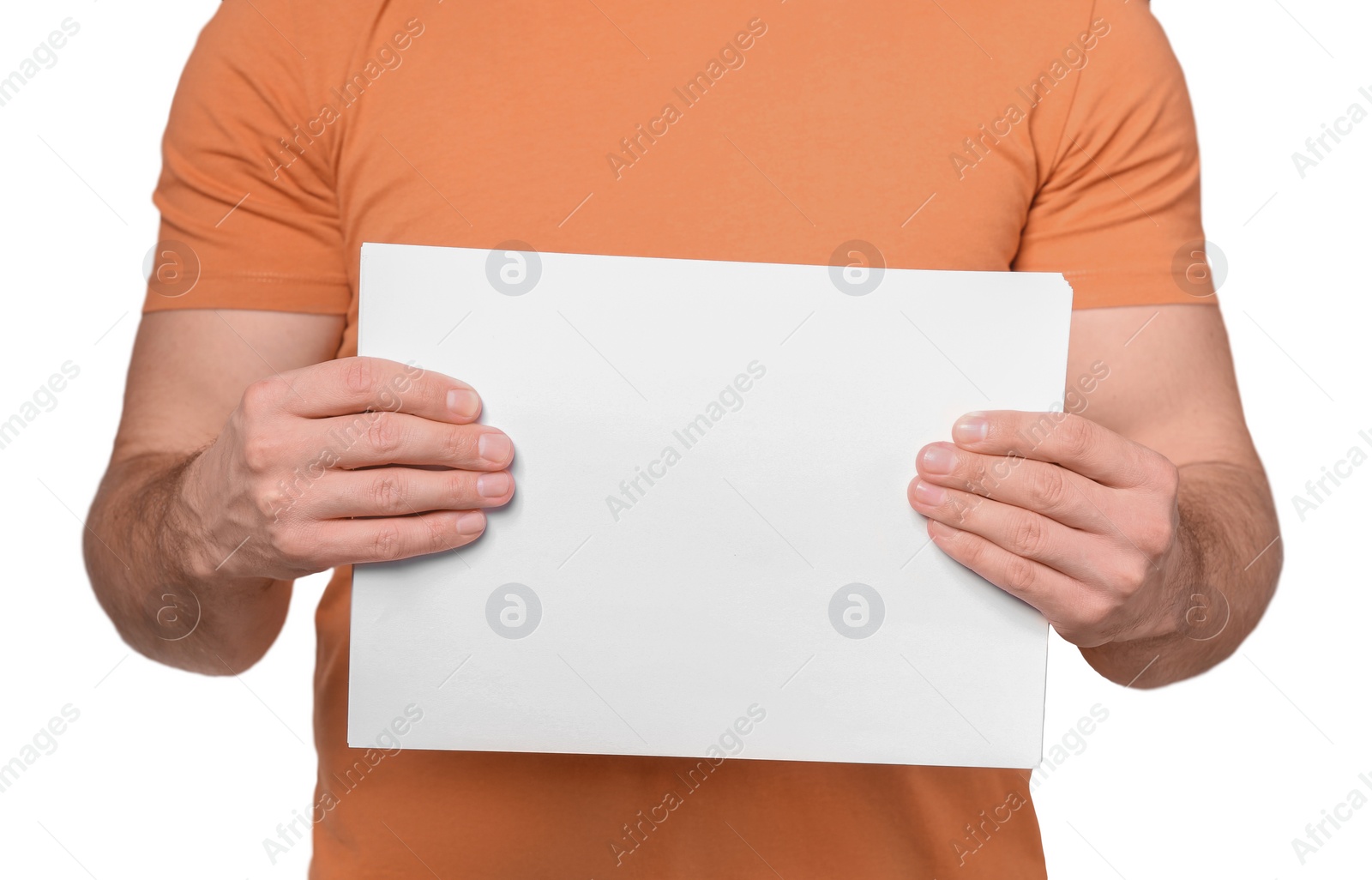 Photo of Man holding sheet of paper on light grey background, closeup. Mockup for design