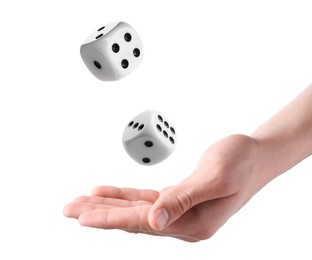 Man throwing dice on white background, closeup