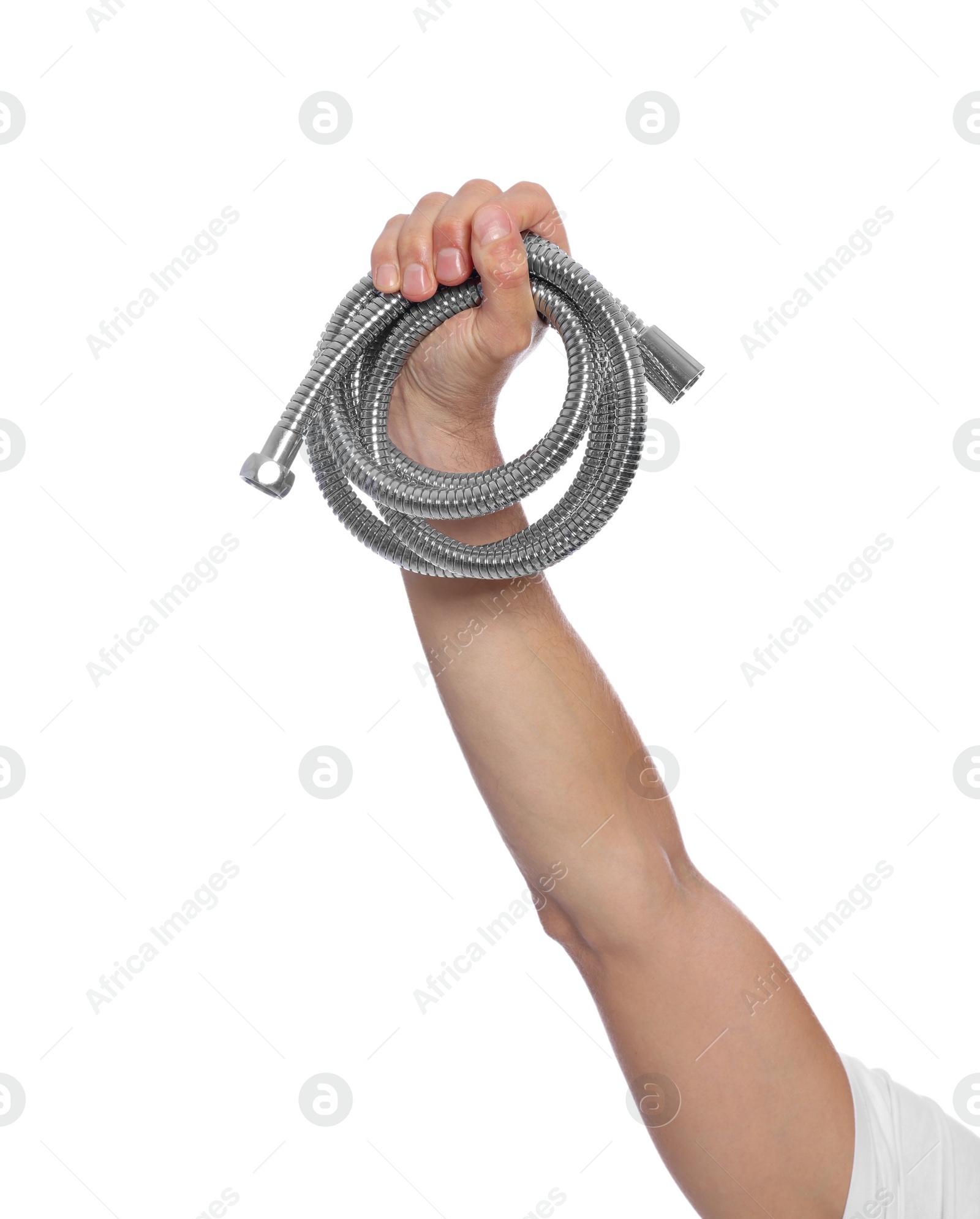 Photo of Male plumber holding flexible hose on white background, closeup