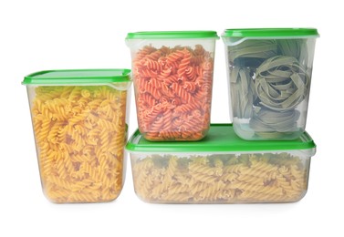 Photo of Plastic containers filled with pasta isolated on white