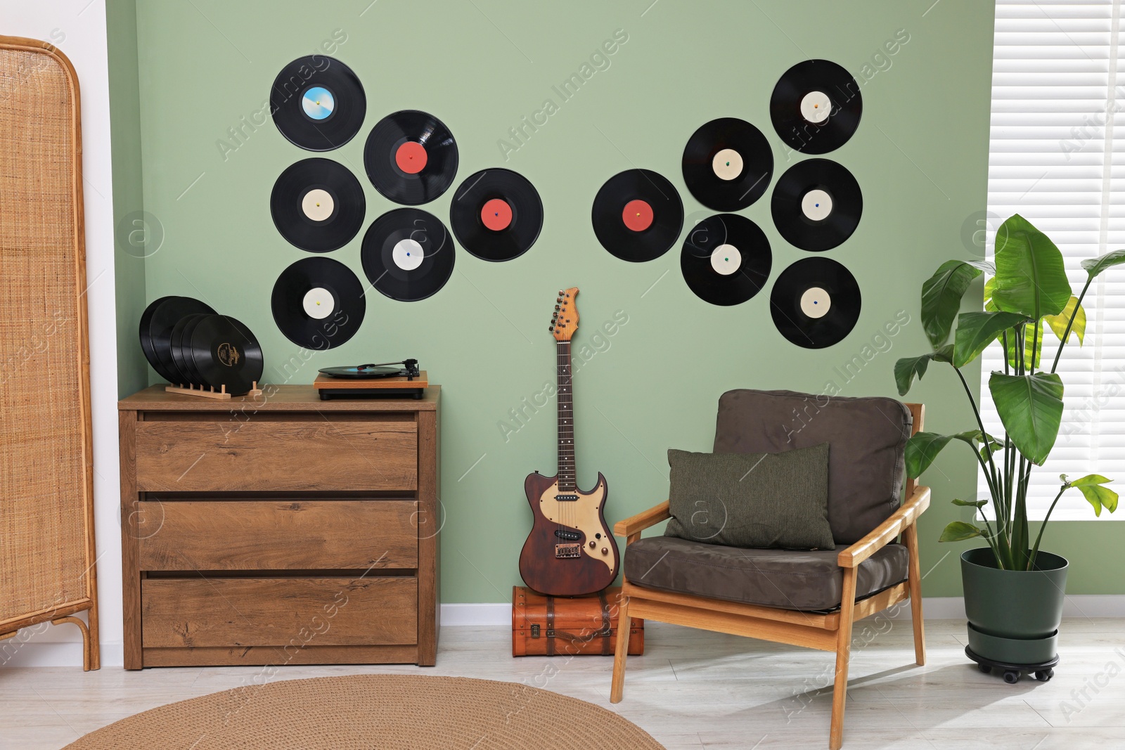 Photo of Living room interior decorated with vinyl records