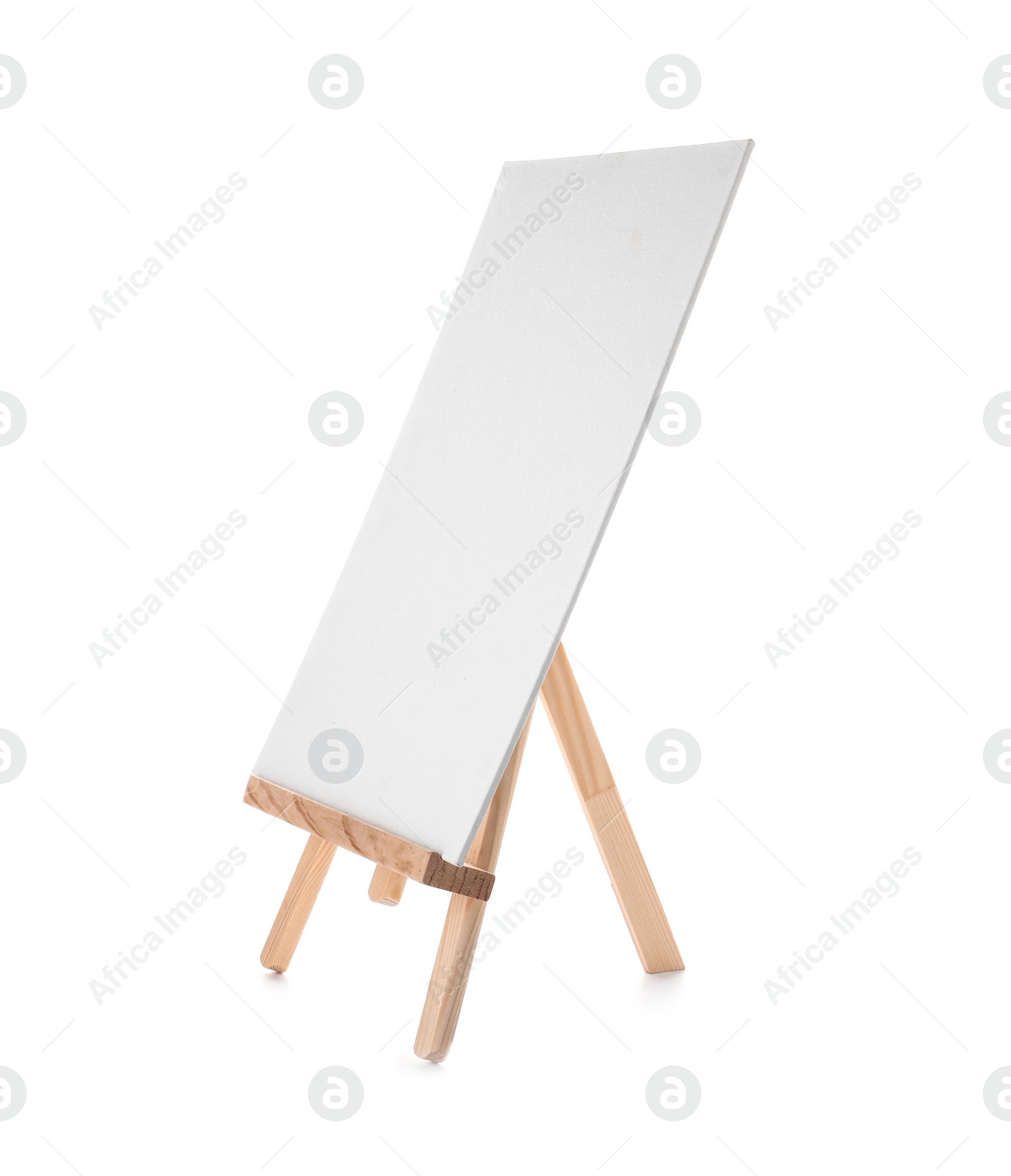 Photo of Wooden easel with blank canvas board on white background. Children's painting