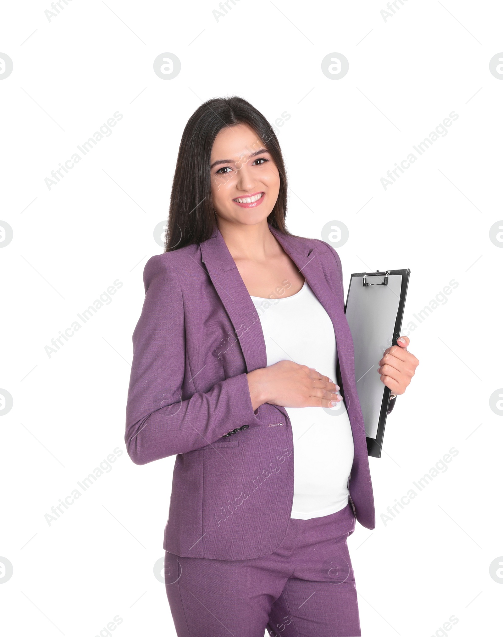 Photo of Young pregnant woman in suit with clipboard on white background. Working while expecting baby