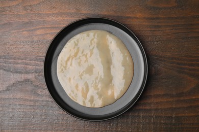 Making kombucha. Scoby fungus on wooden table, top view