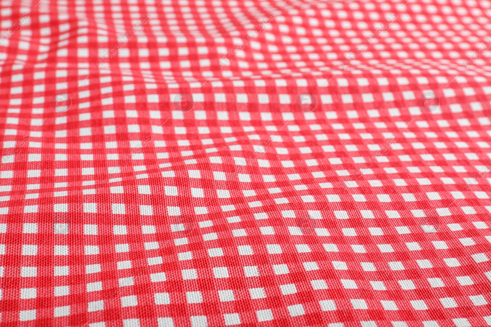 Photo of Classic red checkered picnic tablecloth as background