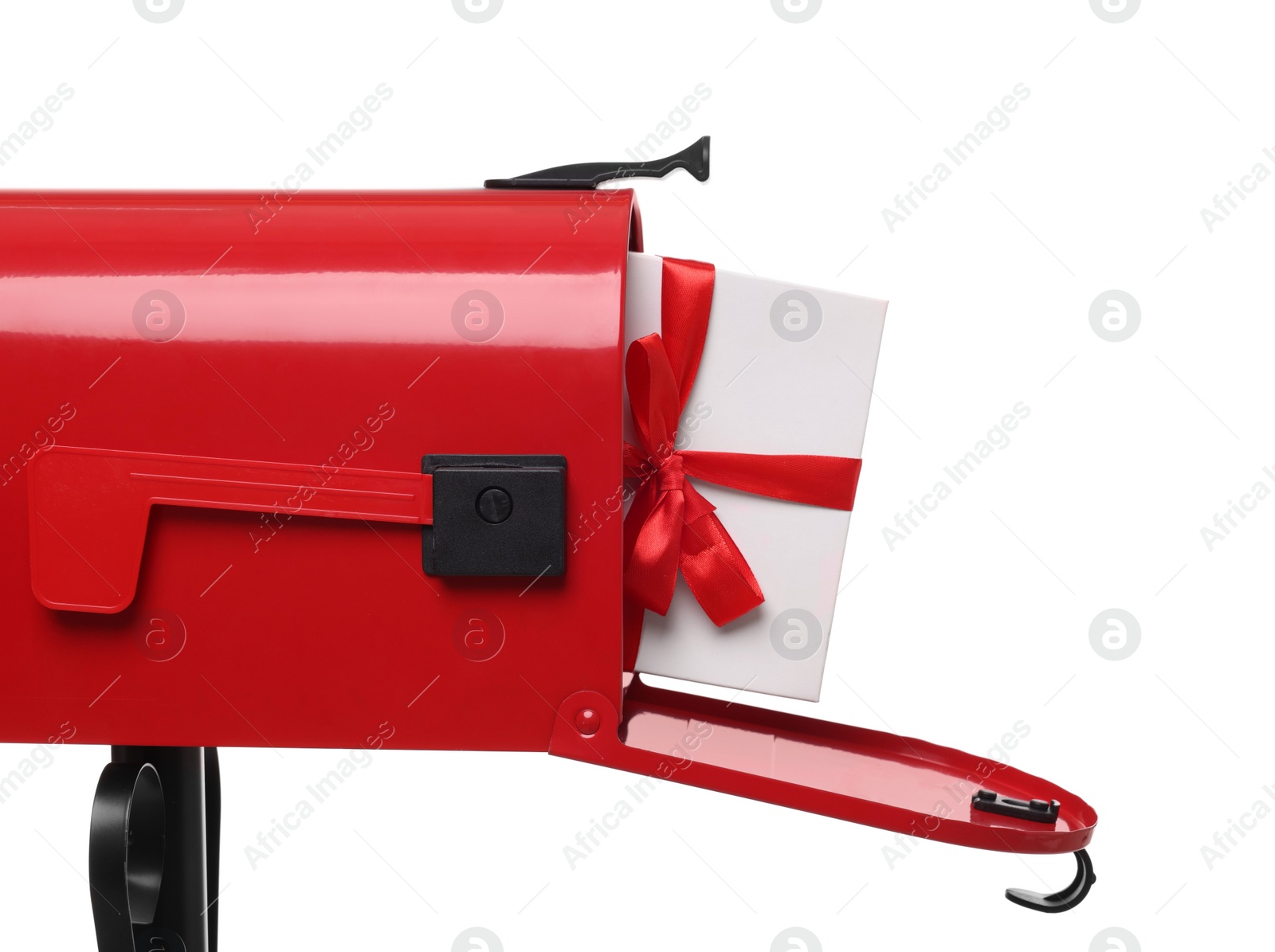 Photo of Red mailbox with Christmas gift isolated on white. Sending present by mail