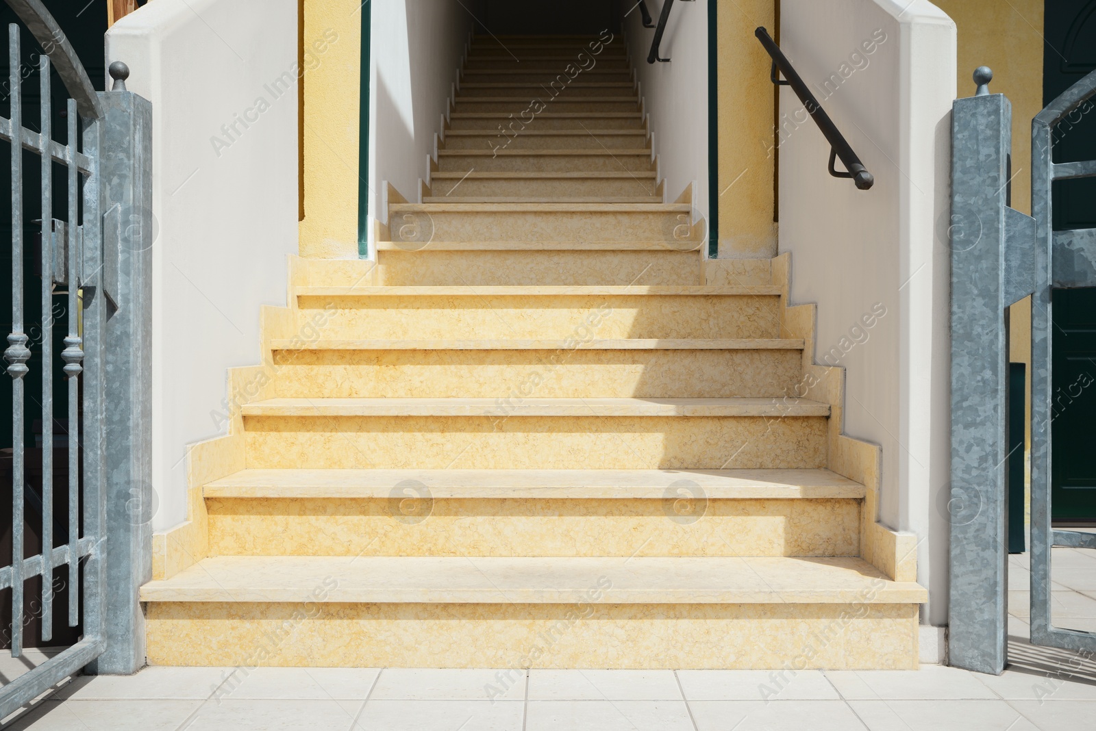 Photo of Stairs leading to entrance of house outdoors