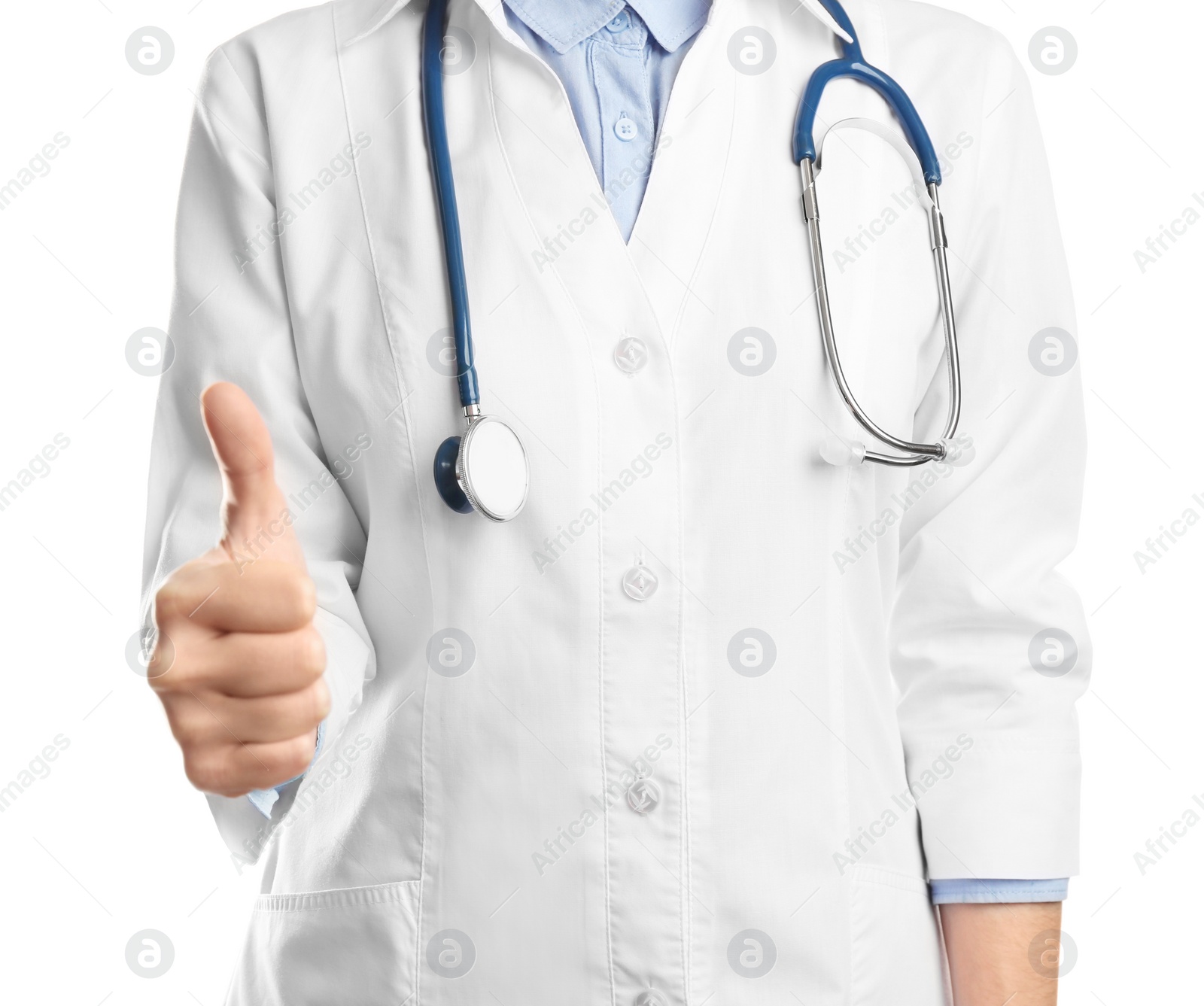 Photo of Doctor showing thumb up on white background, closeup. Medical service