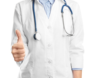 Photo of Doctor showing thumb up on white background, closeup. Medical service