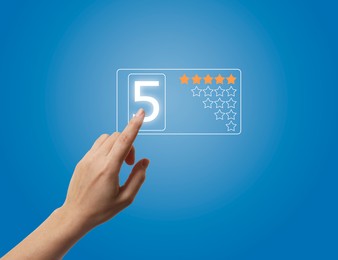 Image of Woman choosing five stars on virtual screen, closeup. Customer satisfaction score