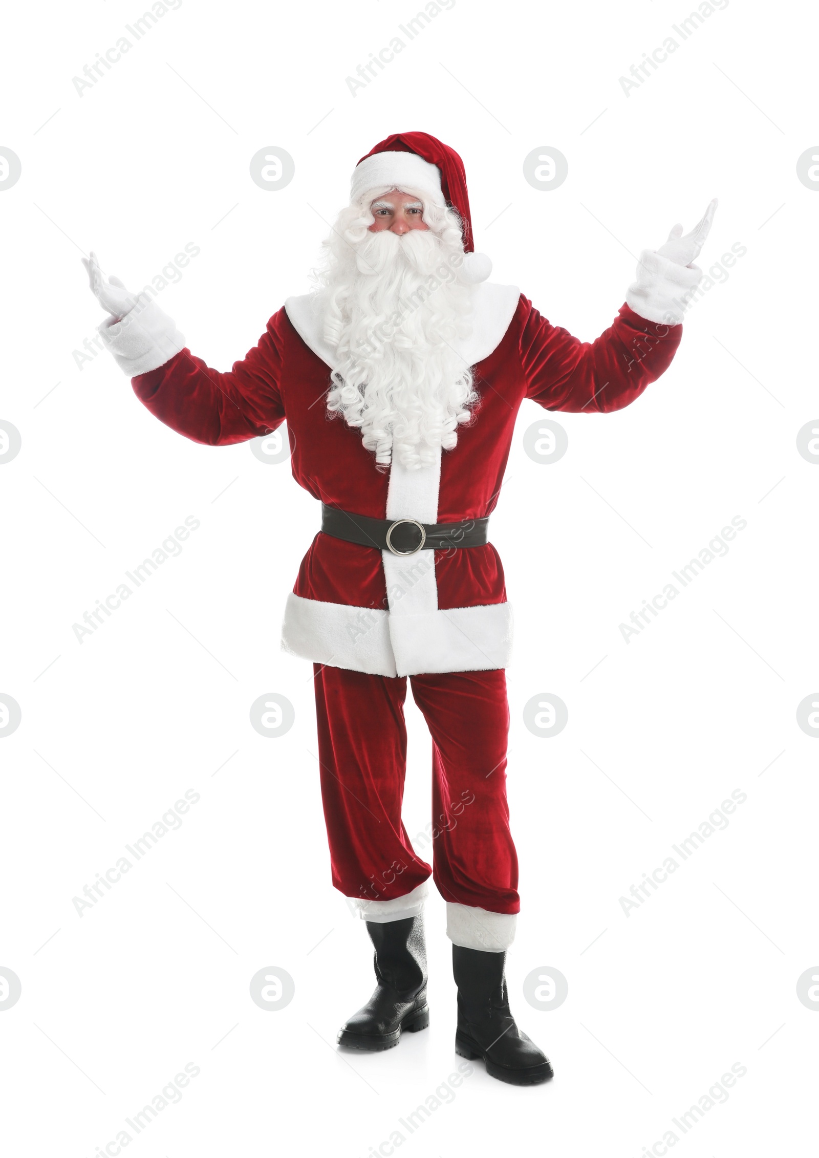 Photo of Full length portrait of Santa Claus on white background