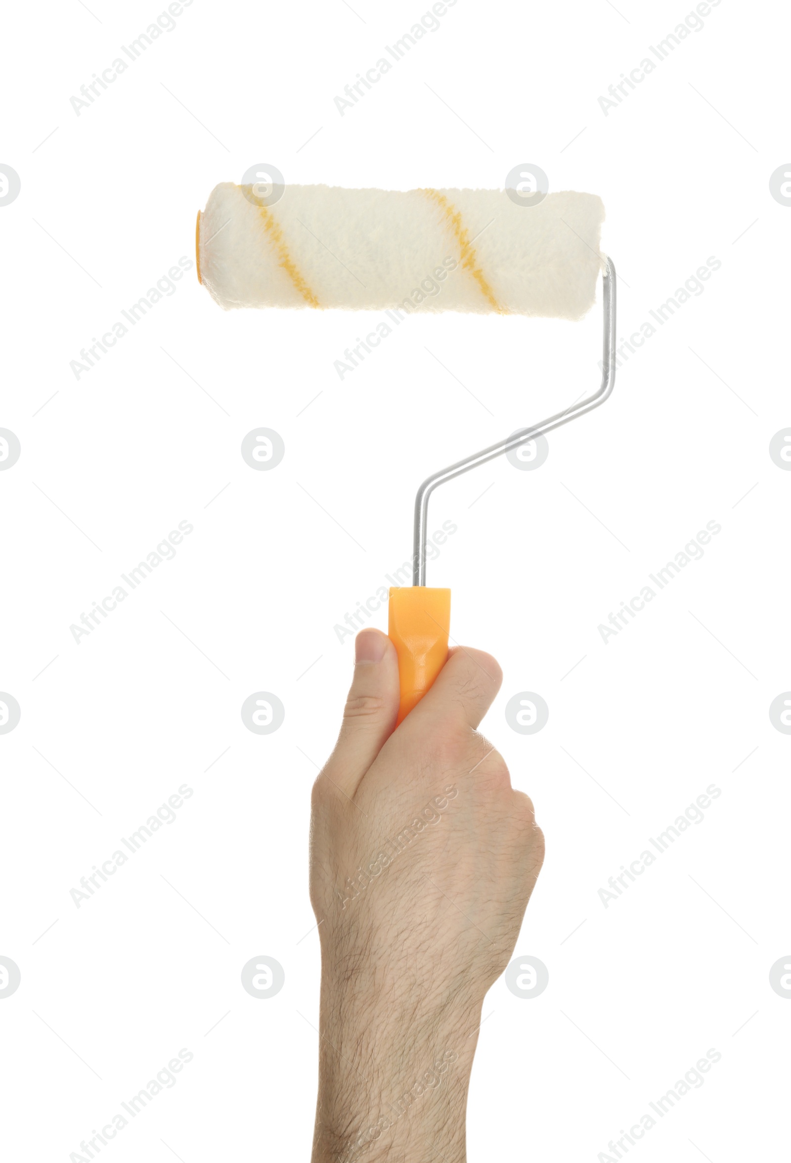 Photo of Man holding paint roller brush on white background, closeup