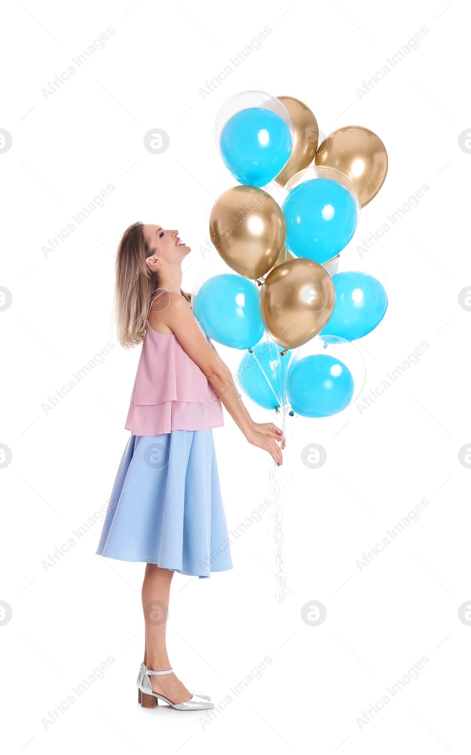 Photo of Young woman with air balloons on white background