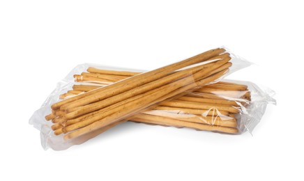 Fresh delicious grissini sticks on white background