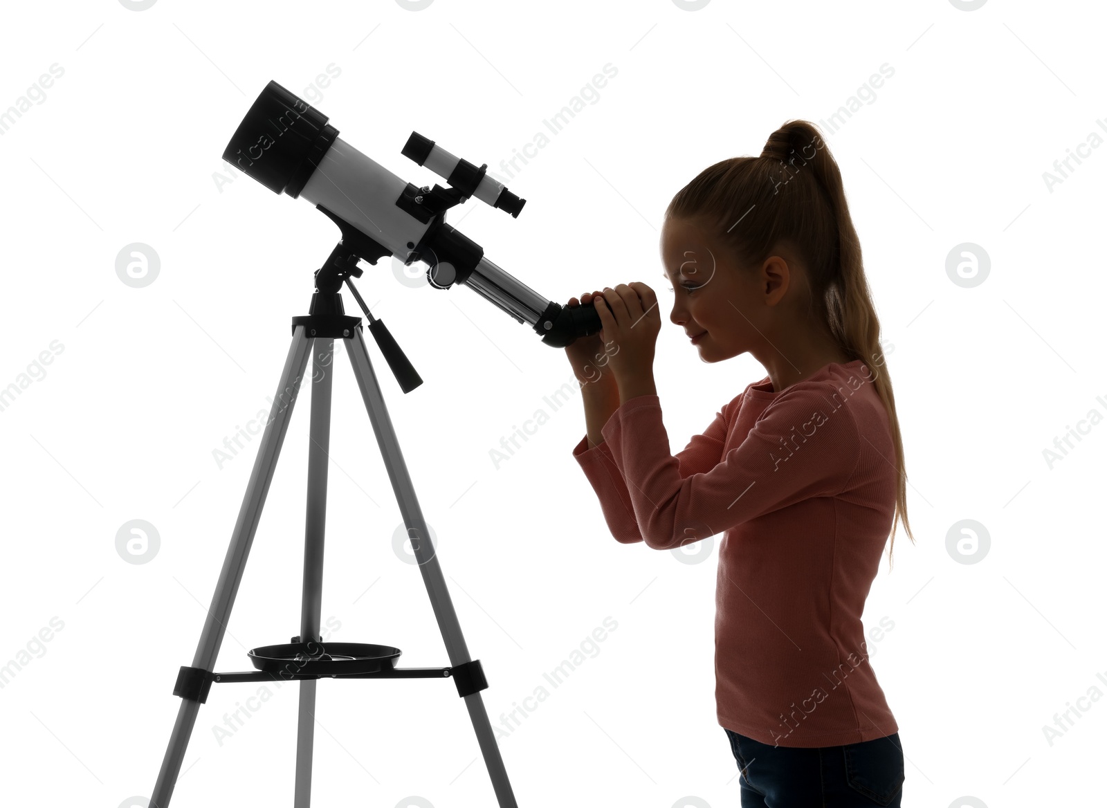 Photo of Happy little girl looking at stars through telescope on white background